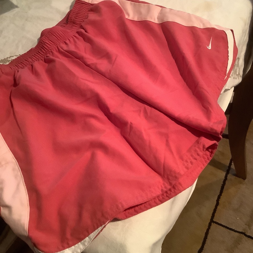 Ladies Nike rose colored running shorts